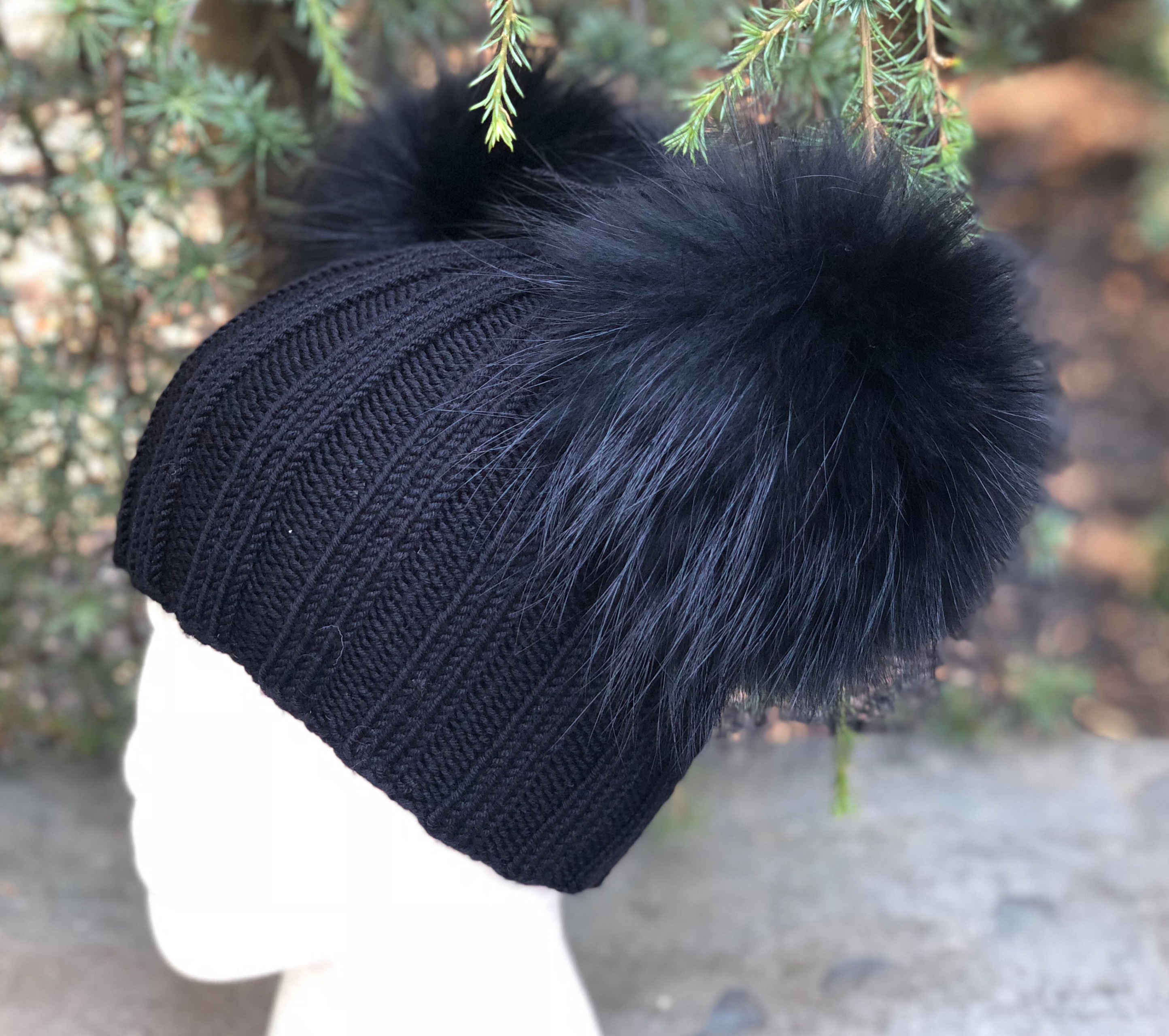 black pom pom hat